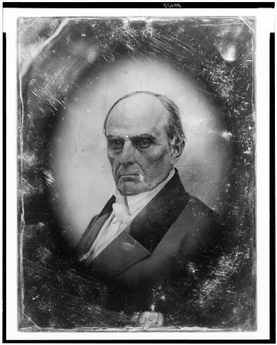 Daguerreotype portrait of a balding older man in a dark coat