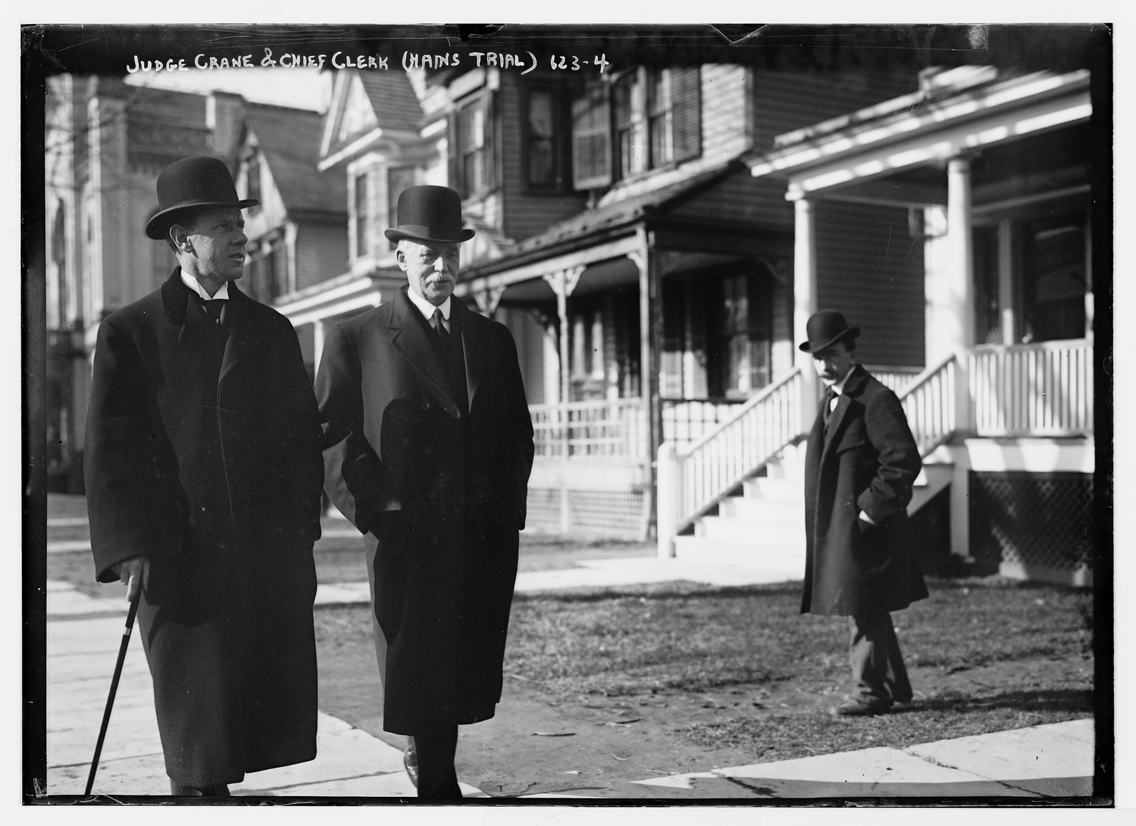 Judge Crane and Chief Clerk during Hains trail, on sidewalk, New York, n/a — historic photograph