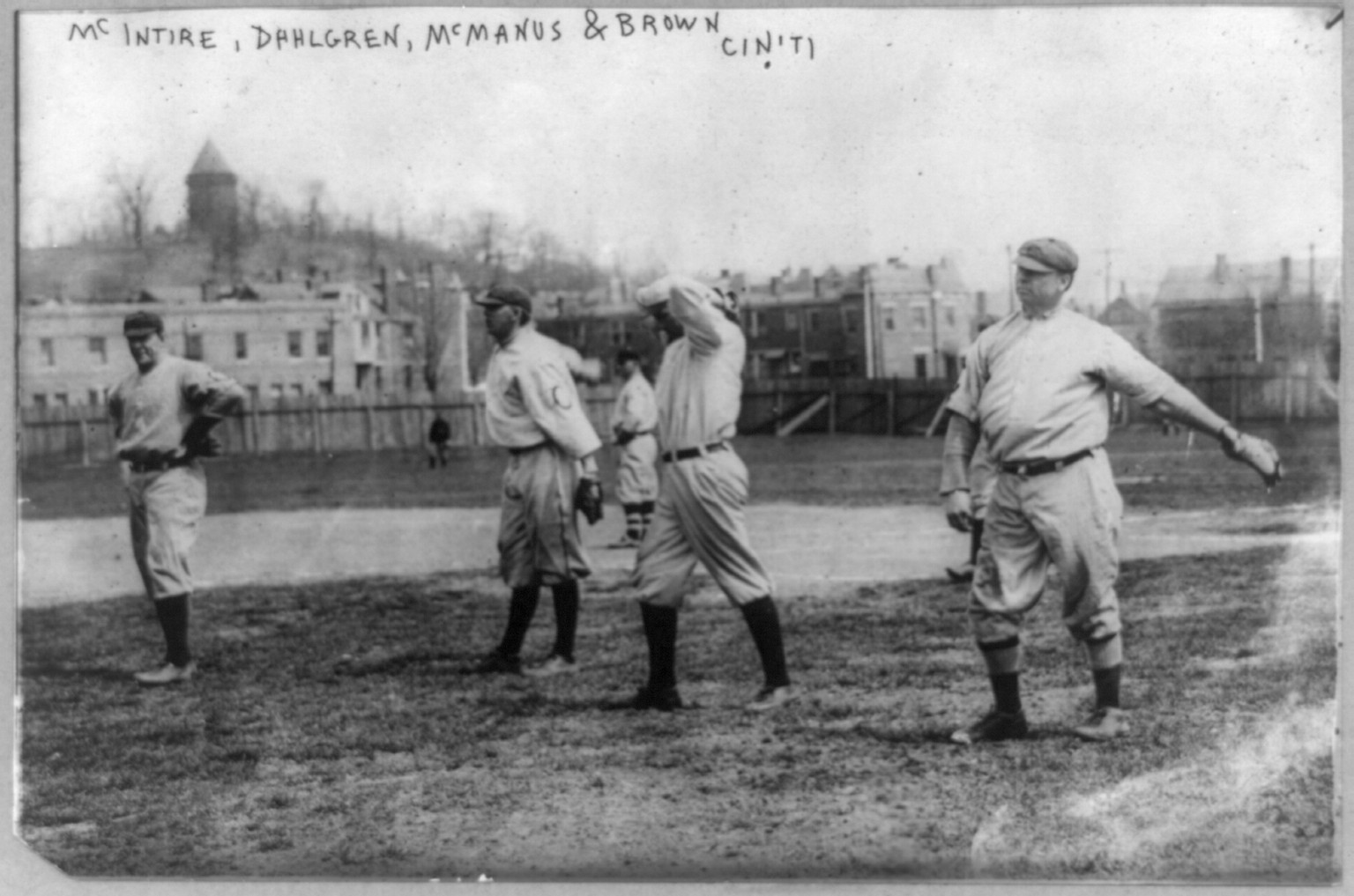 [Harry McIntire, Dahlgren, Joab Logan Joe" McManus and Mordecai "Three Fingers" Brown of Cincinnati baseball team on field]", [1913 June 20] — historic photograph